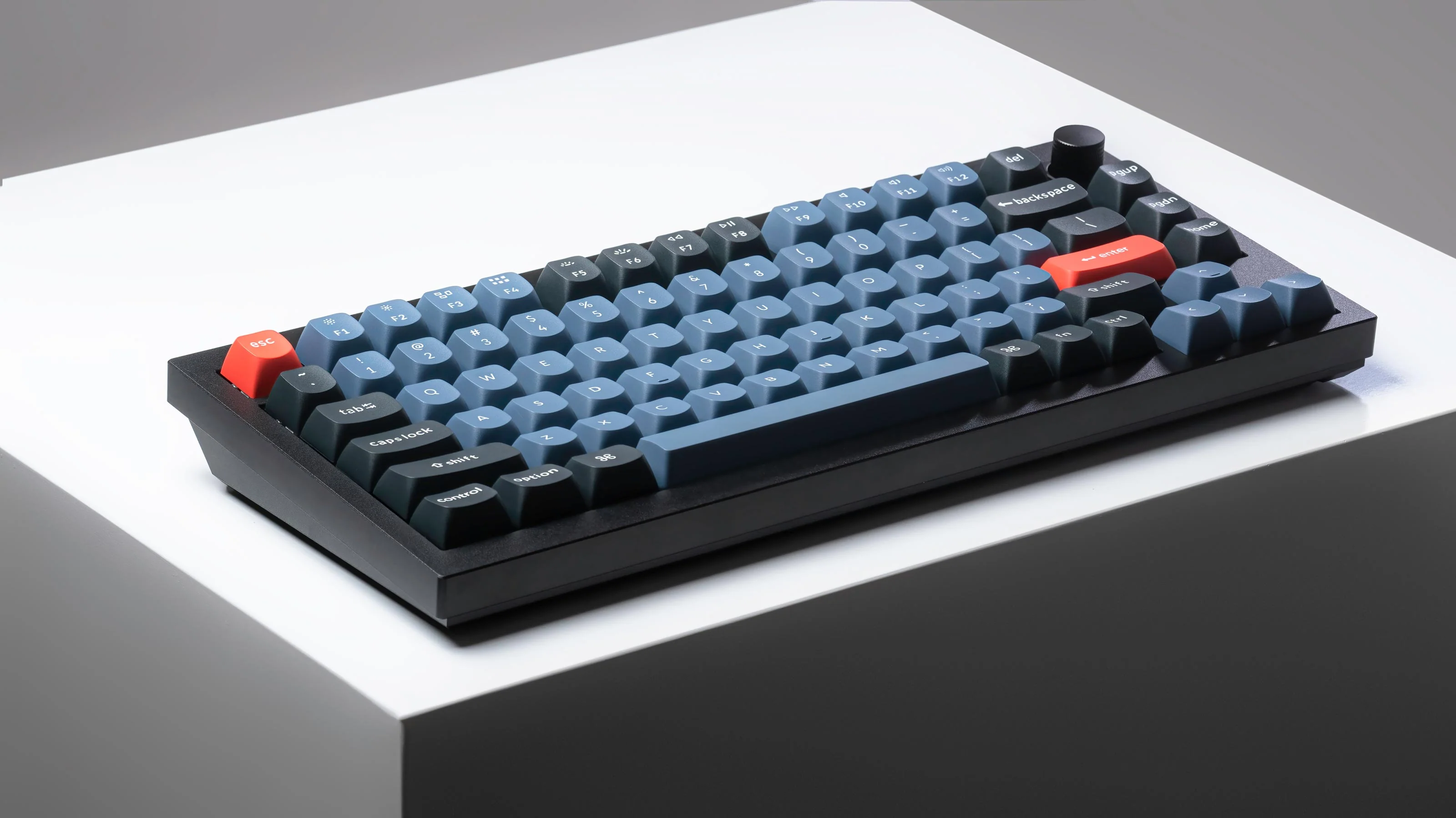 Hands positioned over a compact 75% keyboard during a late-night work session